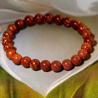 Sunstone stone with vibrant golden shimmer symbolizing positivity and vitality